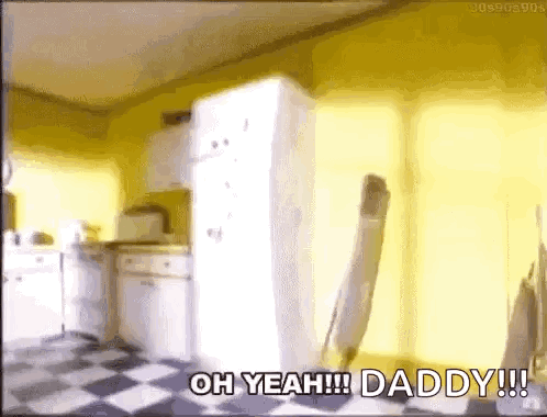 A Kitchen With A White Refrigerator And A Checkered Floor And The Words Oh Yeah Daddy . GIF