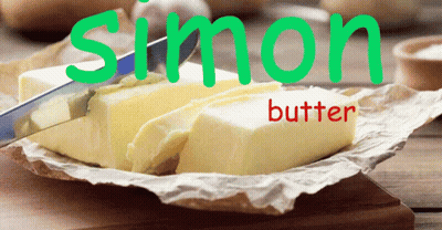 A Knife Is Cutting A Piece Of Butter That Says Simon Butter On It GIF