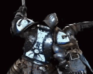 A Knight In Armor Is Holding A Sword In His Hand GIF