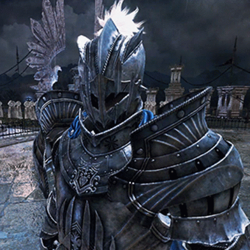 A Knight Wearing A Helmet And Armor Is Standing In Front Of A Cemetery GIF