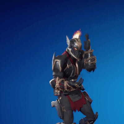 A Knight With A Flame On His Helmet Is Holding A Gun GIF