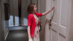 A Lady In A Red Blazer Knock Knock GIF