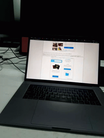 A Laptop Computer Is Open To A Page That Says ' A Few Pictures ' GIF