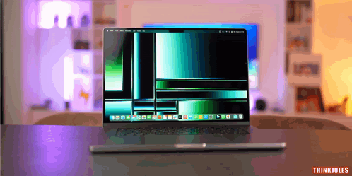 A Laptop On A Table With The Words Thinkjules On The Bottom GIF