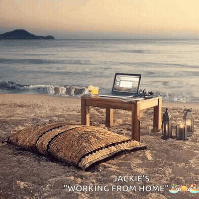 A Laptop Sits On A Small Table On The Beach With The Words Jackie 'S Working From Home GIF