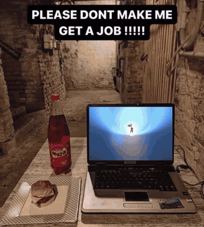 A Laptop Sits On A Table Next To A Bottle Of Sunkist Soda GIF