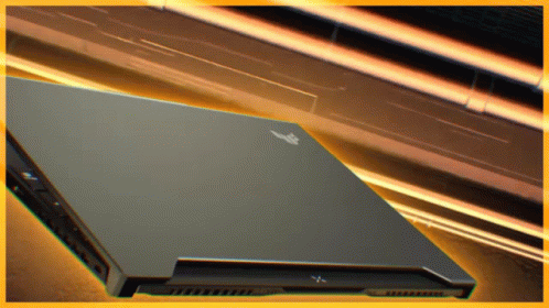 A Laptop With The Letter X On The Back GIF
