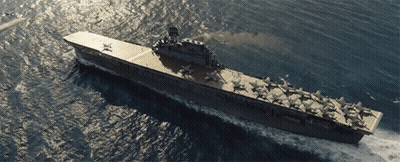 A Large Aircraft Carrier Is Floating In The Ocean With A Few Planes On The Deck GIF