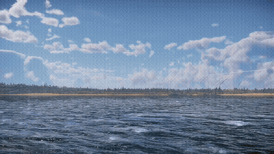 A Large Body Of Water With A Blue Sky And Clouds Behind It GIF