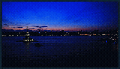 A Large Body Of Water With A Tower In The Middle Of It GIF