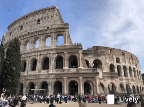 A Large Building With The Word Lively On The Bottom Left GIF