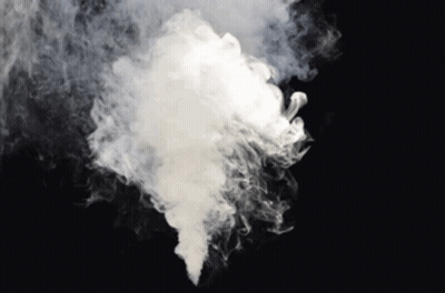 A Large Cloud Of White Smoke Is Coming Out Of A Bottle On A Black Background . GIF