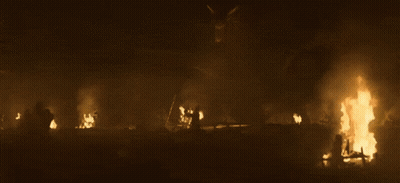 A Large Fire Is Burning In The Dark GIF