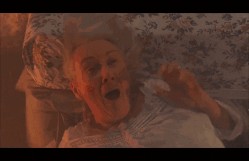 A Large Fire Is Coming Out Of A Building In A Video Game GIF
