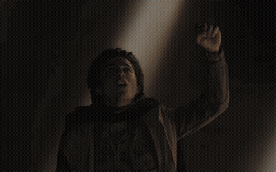 A Large Group Of People Are Gathered In A Dark Room With The Words " I Am The Voice From The Outer World " On The Bottom GIF