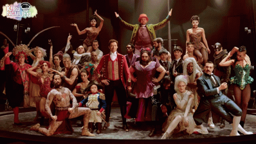 A Large Group Of People Are Posing For A Photo With Khỏi Người In The Upper Right Corner GIF