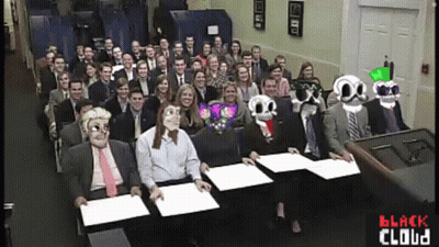 A Large Group Of People Are Sitting In A Room With The Words Black Cloud Written On The Bottom GIF