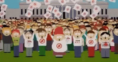 A Large Group Of People Are Standing In Front Of A Building And Holding Up Flags . GIF