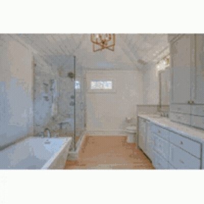 A Large House With A Lush Green Lawn And A Brick Walkway Leading To It . GIF