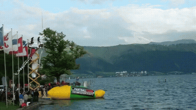 A Large Inflatable Boat With The Word Paintball On The Side Of It GIF
