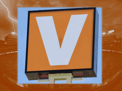 A Large Orange Sign With The Letter V In The Middle GIF