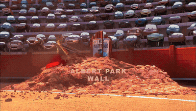 A Large Pile Of Dirt With The Words Albert Park Wall On It GIF
