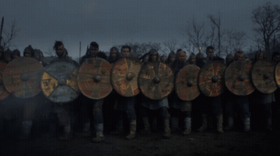 A Large Pile Of Logs Is Burning In A Field GIF