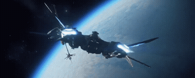 A Large Space Ship Is Flying Over The Earth In Space GIF