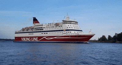 A Large Viking Line Cruise Ship Is Floating On The Water GIF
