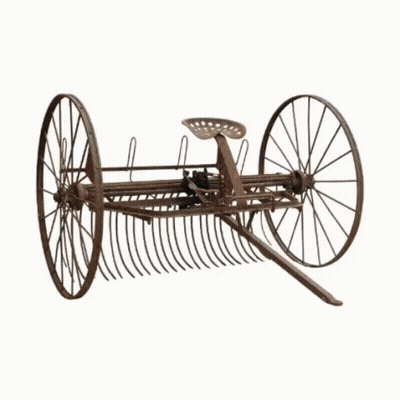 A Large Yellow Bulldozer With Chains On The Wheels GIF