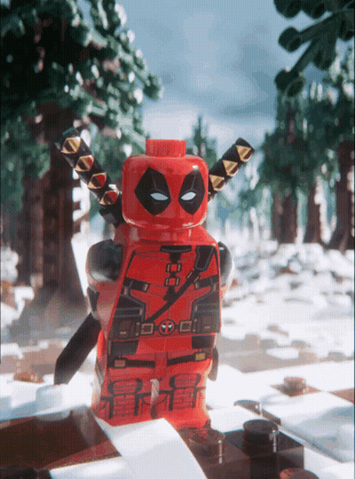 A Lego Deadpool Figure Stands In The Snow GIF