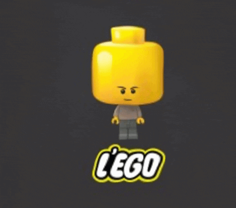A Lego Head With A Man 'S Face On It GIF