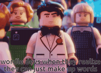 A Lego Man In A Tuxedo And Bow Tie Stands In Front Of A Crowd GIF