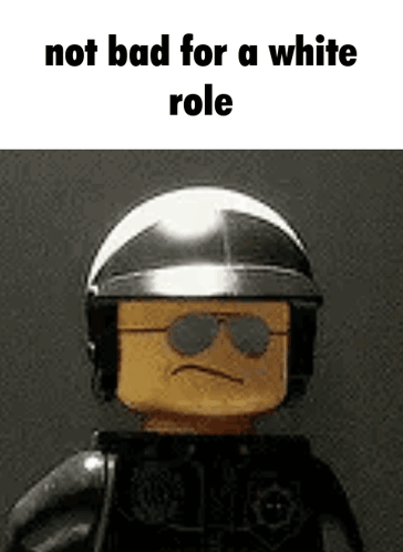 A Lego Police Officer Is Wearing A Helmet And Sunglasses And Says `` Not Bad For A White Role '' . GIF