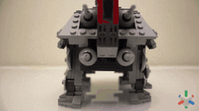 A Lego Robot With A Red Stripe On The Front GIF