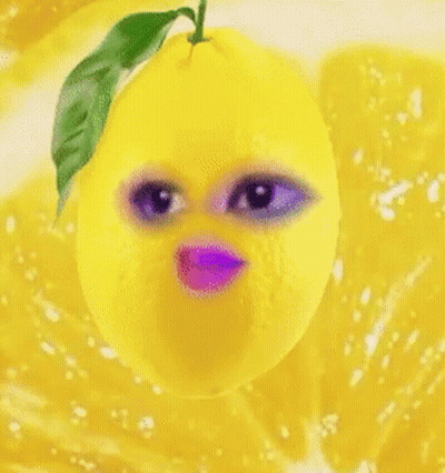 A Lemon With A Purple Mouth And Eyes GIF