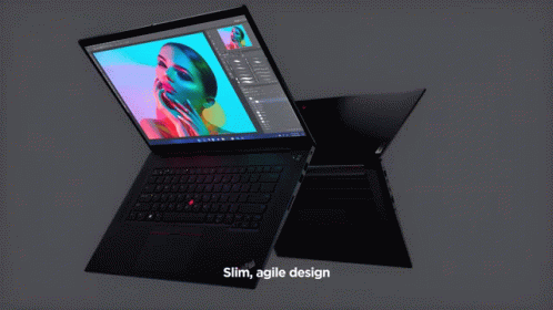 A Lenovo Laptop With A Picture Of A Woman On Its Screen GIF
