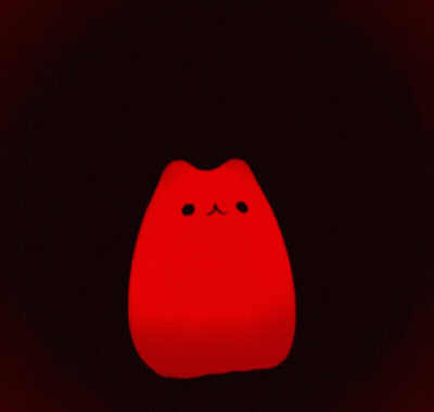 A Light That Looks Like A Cat With A Small Face GIF