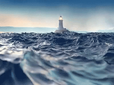 A Lighthouse In The Middle Of The Ocean With Waves Crashing Around It GIF