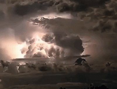 A Lightning Bolt Is Coming Out Of The Clouds GIF