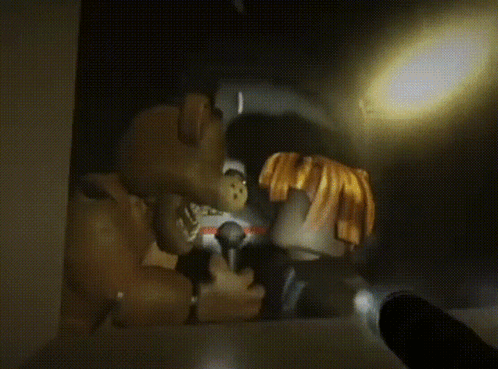 A Lion And A Monkey Looking At Each Other With Their Mouths Open GIF