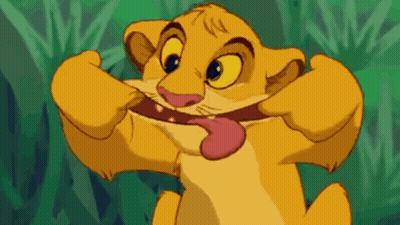 A Lion Cub From The Lion King Is Making A Funny Face With His Tongue Out . GIF