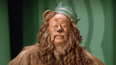 A Lion With A Green Crown On His Head GIF