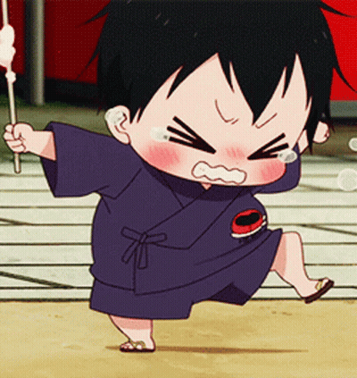 A Little Boy In A Blue Kimono Is Holding A Stick GIF