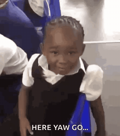 A Little Boy In A School Uniform Is Sitting On A Blue Chair . GIF
