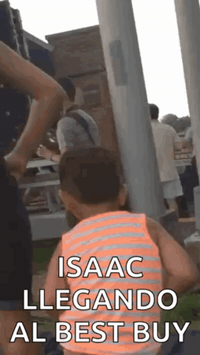 A Little Boy In An Orange And White Striped Tank Top Says Isaac Llegando Al Best Buy In Spanish GIF