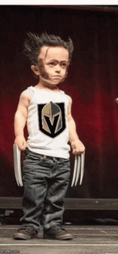 A Little Boy Is Dressed As Wolverine And Is Holding Claws GIF