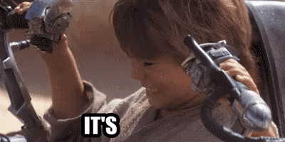 A Little Boy Is Holding A Gun In His Hand And Says `` It 'S '' . GIF