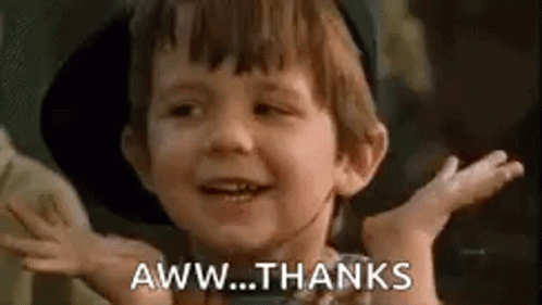 A Little Boy Is Making A Funny Face And Saying `` Aww Thanks '' . GIF