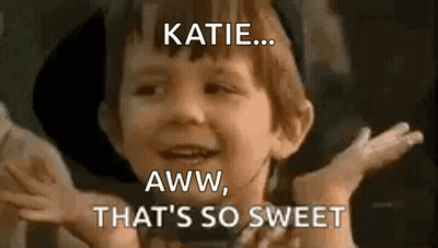 A Little Boy Is Making A Funny Face And Saying Katie Aww That 'S So Sweet GIF